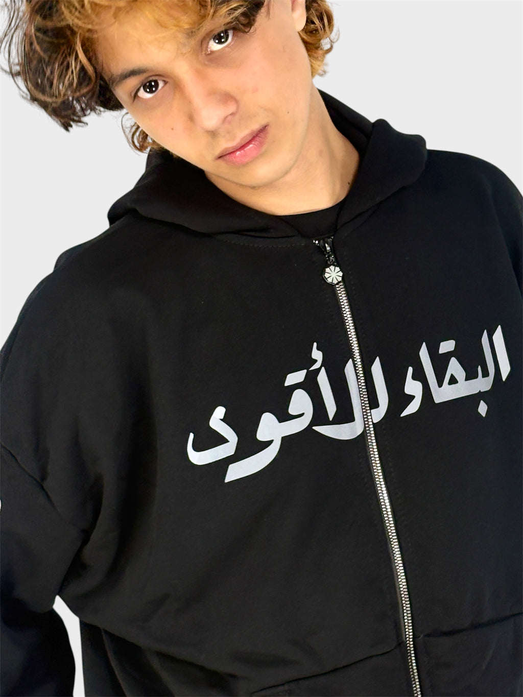 "البقاء للأقوى" ZIP UP HOODIE